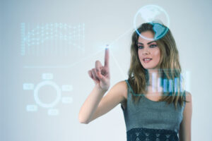 Businesswoman working with modern virtual technologies hands touching the screen