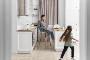 woman-working-home-with-kid