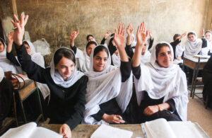 Women study at the Abul Qasim Fierdousi Girls secondary school in Kabul, Afghanistan August 08, 2002. (photo by Ami Vitale)