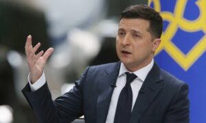 (210521) -- KIEV, May 21, 2021 (Xinhua) -- Ukrainian President Volodymyr Zelensky attends a press conference devoted to his two years in office in Kiev, Ukraine, May 20, 2021. Zelensky believes a meeting with Russian President Vladimir Putin would help to put an end to the seven-year-conflict in Donbass, the Ukrainian president's press service reported on Thursday. (Photo by Sergey Starostenko/Xinhua)