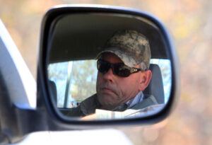 FILE - In this Wednesday, Aug. 5, 2015, professional hunter Theo Bronkhorst is seen in his car upon his arrival at the magistrates courts to face trial in Hwange about 700 kilometres south west of Harare, Zimbabwe. Bronkhorst who helped an American dentist kill a well-known lion named Cecil has now been arrested for allegedly trying to smuggle sable antelopes into South Africa, Zimbabwean police said Tuesday Sept. 15, 2015. (AP Photo/Tsvangirayi Mukwazhi)