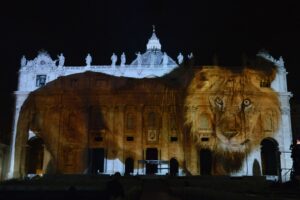 TOPSHOTS A picture is projected on St. Peters Basilica during the show Fiat Lux : Illuminating Our Common Home, on December 8, 2015 at the Vatican. Images by some of the world's greatest environmental photographers, including Sebastião Salgado, Joel Sartore, Yann Arthus-Bertrand and Louie Schwartzberg, are projected in solidarity with COP21 talks in Paris. It is also part of the inauguration of the Roman Catholic Churchs yearlong Jubilee of Mercy, which starts today.  AFP PHOTO / TIZIANA FABI