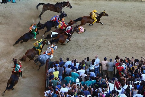 A moment of the annual Palio dell'Assunta in Siena, Italy, 16 August 2014. The Palio di Siena is held twice each year on 02 July and 16 August and is one of the world's most important horse races. The Palio dell'Assunta held on 16 August honours the Assumption of Mary.  ANSA/ FABIO DI PIETRO