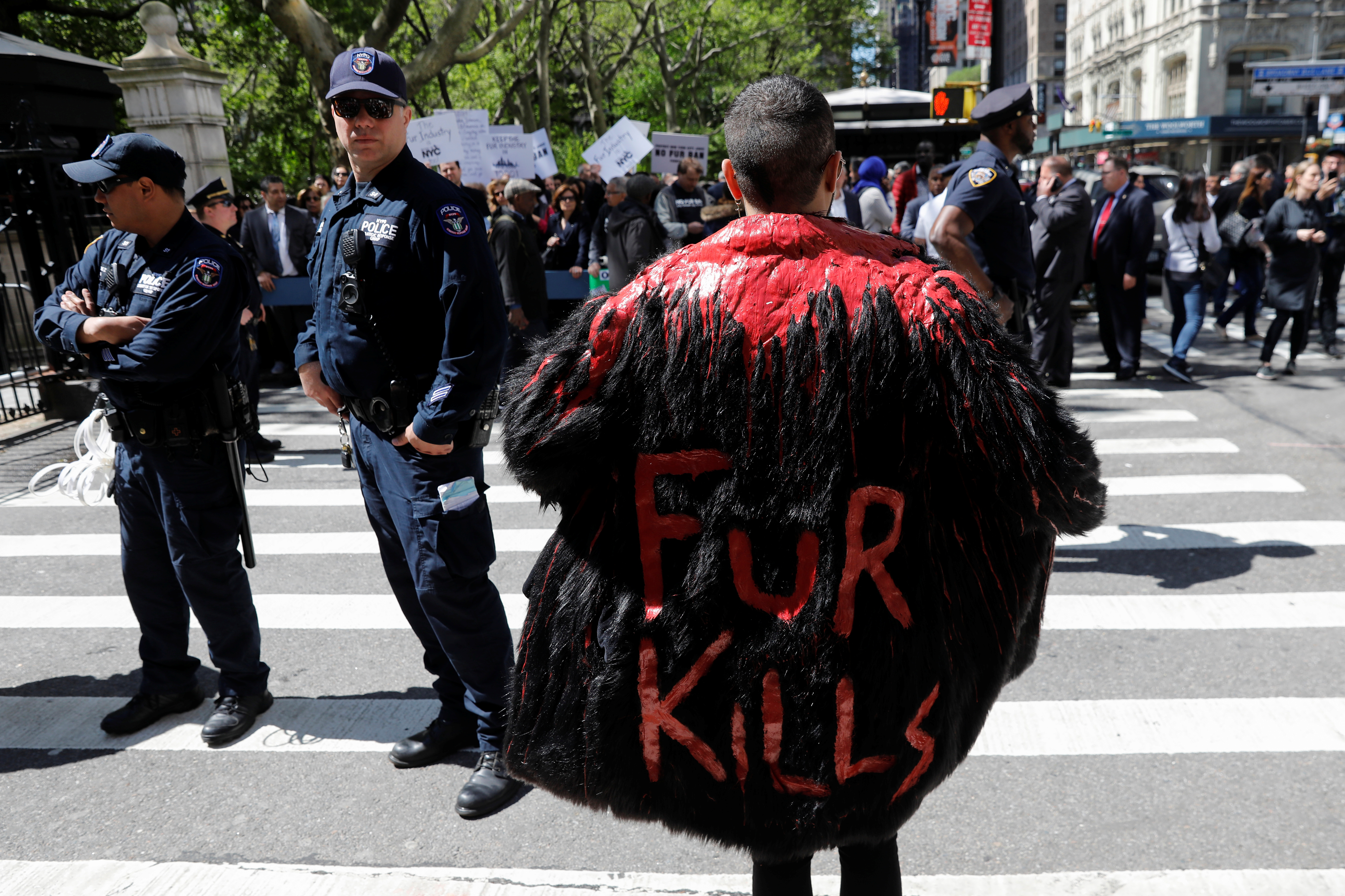 A supporter on the ban on fur sales demonstrates outside of City Hall in New York, U.S., May 15, 2019. REUTERS/Shannon Stapleton
