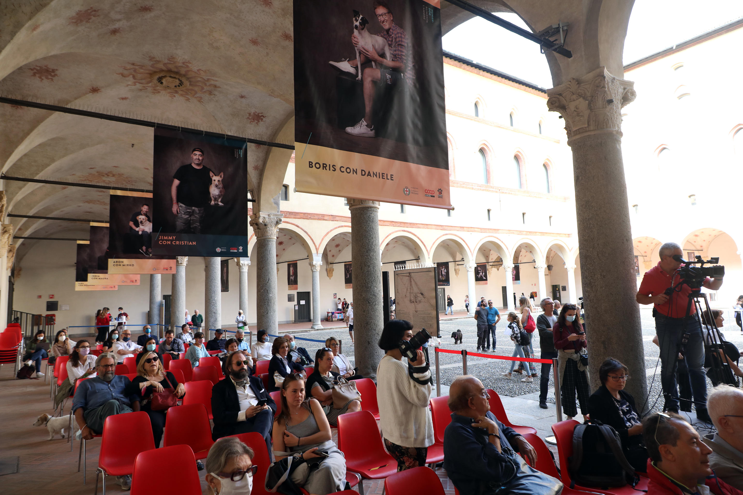 Alcune delle foto realizzate da Silvia Amodio ed esposte al castello Sforzesco di Milano in occasione della mostra Human dog, alimenta lamore. Milano 2 Ottobre 2021. ANSA / MATTEO BAZZI