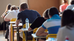 French students work on the test of Philosophy as they take the baccalaureat exam (high school graduation exam) on June 17, 2013 at the Pasteur high school in Strasbourg, eastern France. Some 664.709 candidates are registered for the 2013 session. The exam results will be announced on July 5, 2013. AFP PHOTO/FREDERICK FLORIN (Photo credit should read FREDERICK FLORIN/AFP/Getty Images)